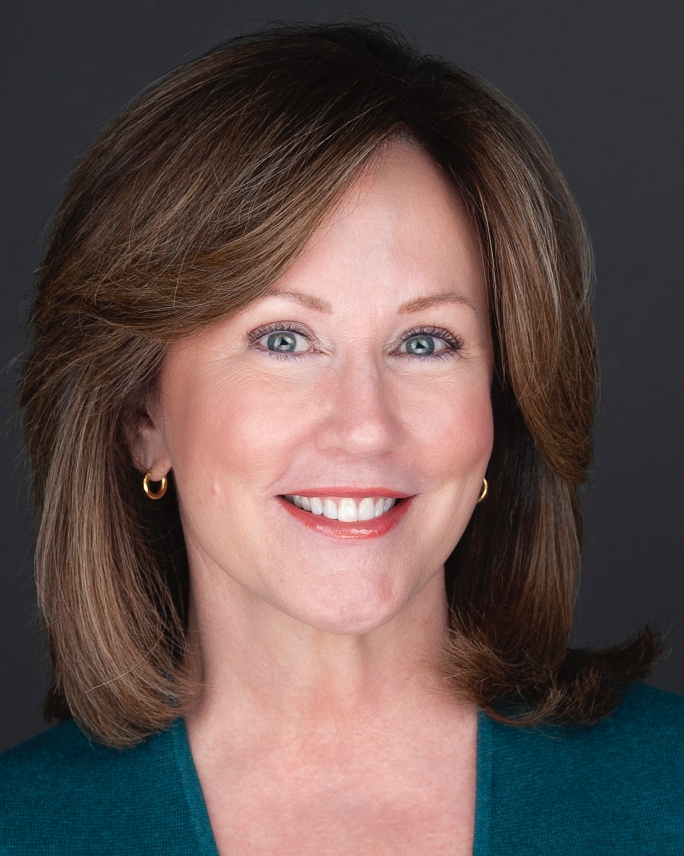 photo of Geralin Thomas smiling happily